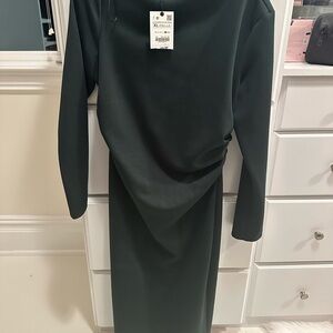 Zara Deep Green dress with rushing on the side boat neck and slit in rear.